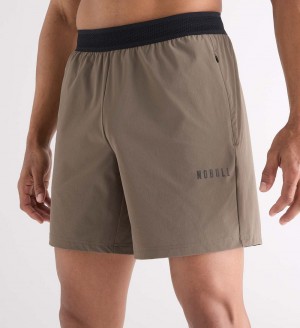 Men NOBULL Solid Stretch 7" Shorts Green | DWNQK-5836